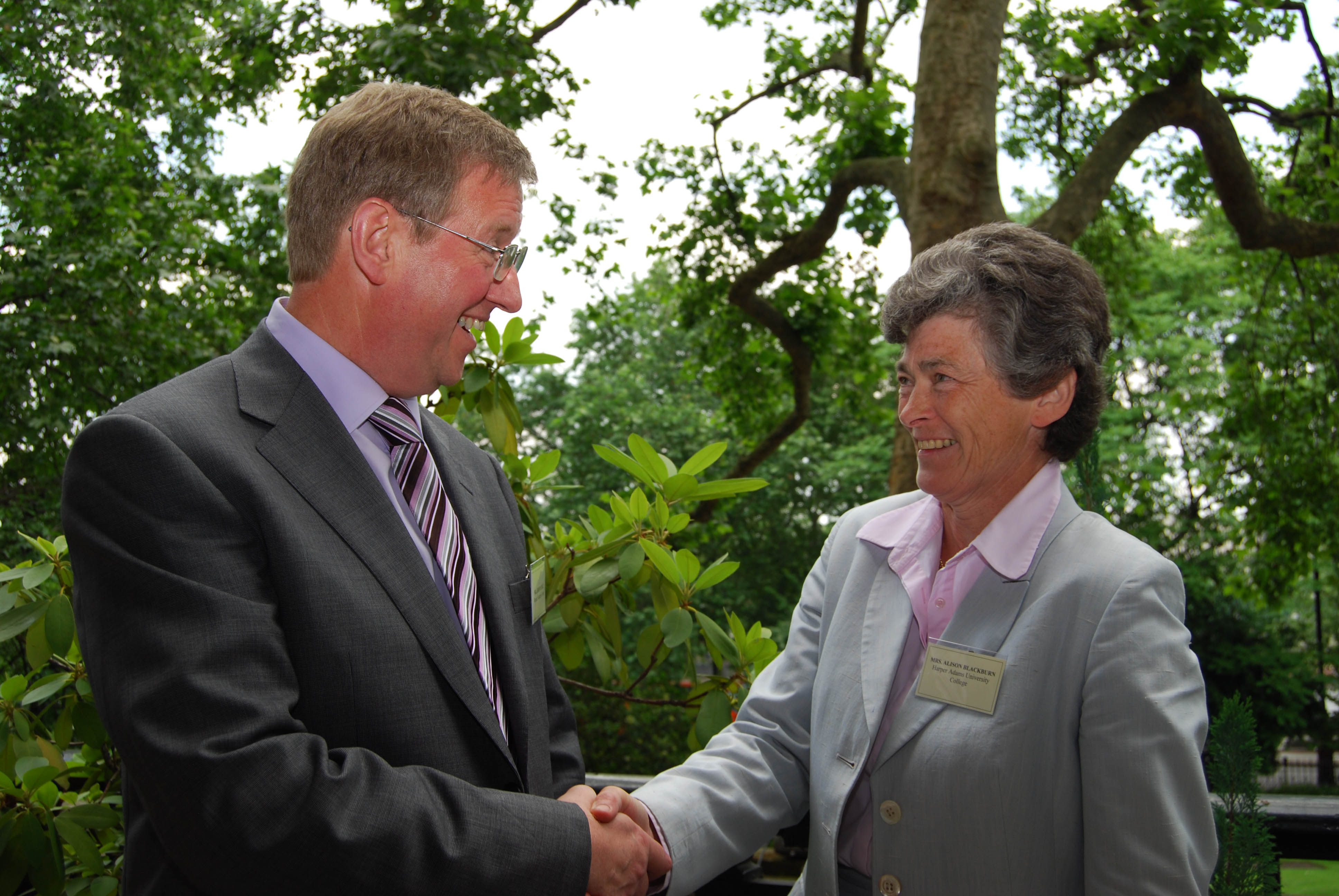 Harper Adams Chairman of Governors Alison Blackburn congratulates Jeremy Hall